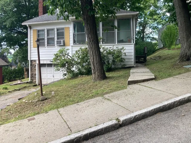 front view of house with a yard