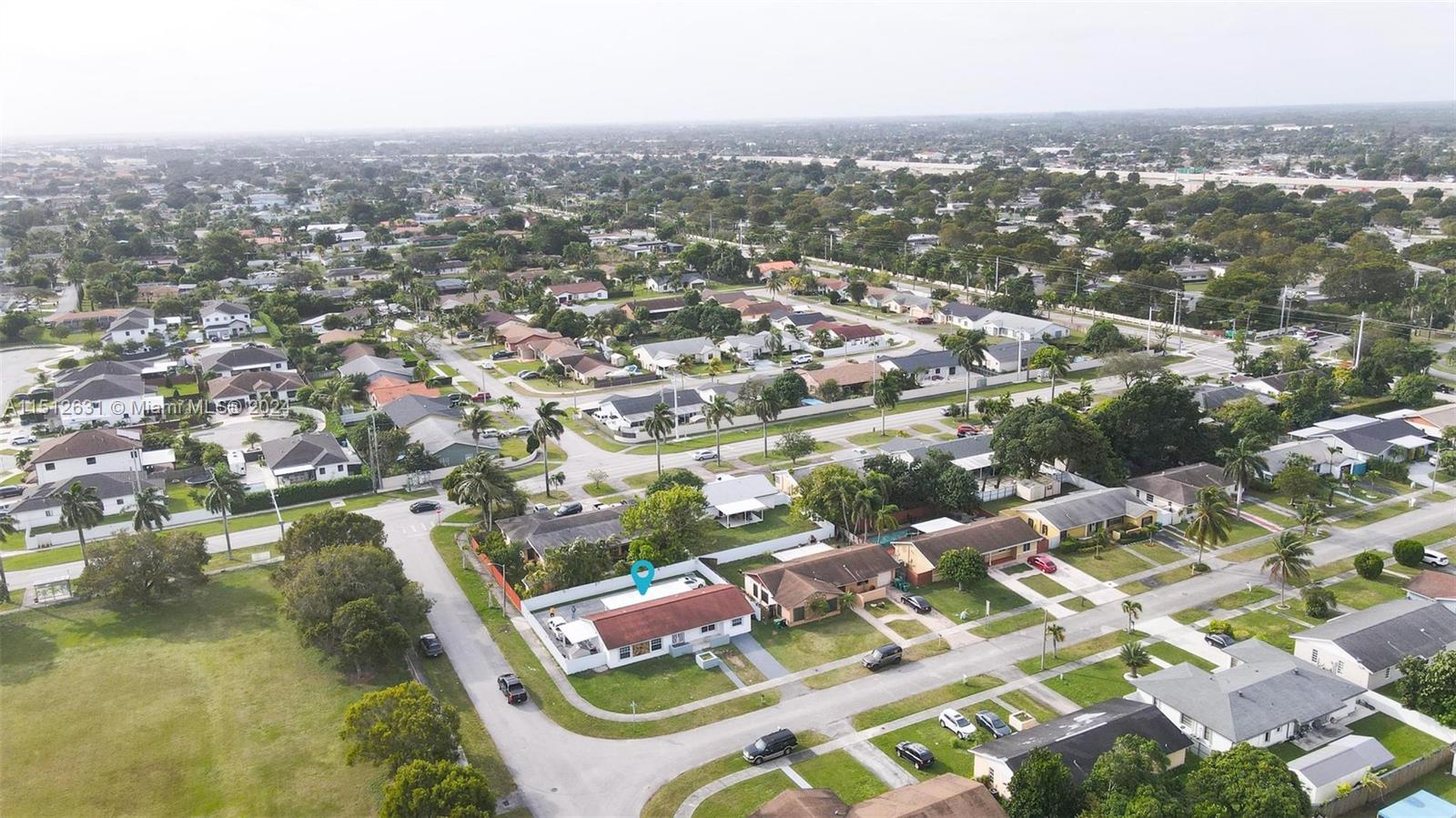 Palmetto Estates Miami, FL 33157 - Photo 27 of 29 an aerial view of residential houses with city view