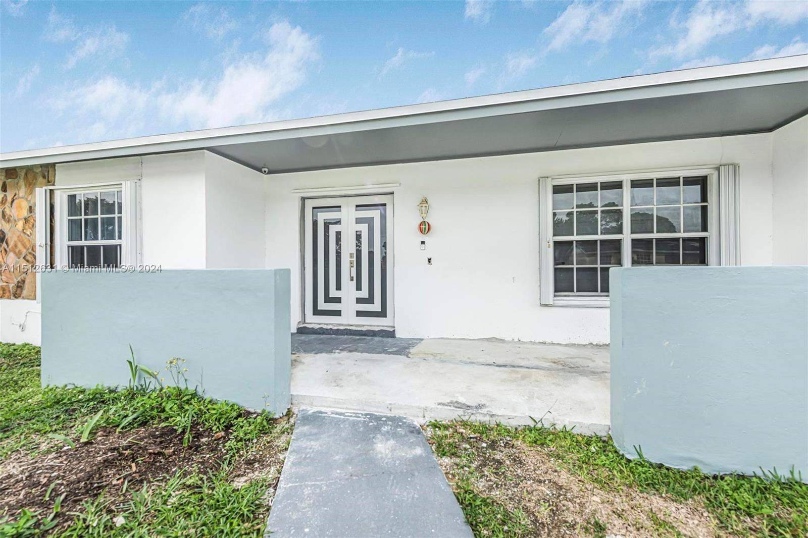 Palmetto Estates Miami, FL 33157 - Photo 4 of 29 front view of a house with a outdoor space