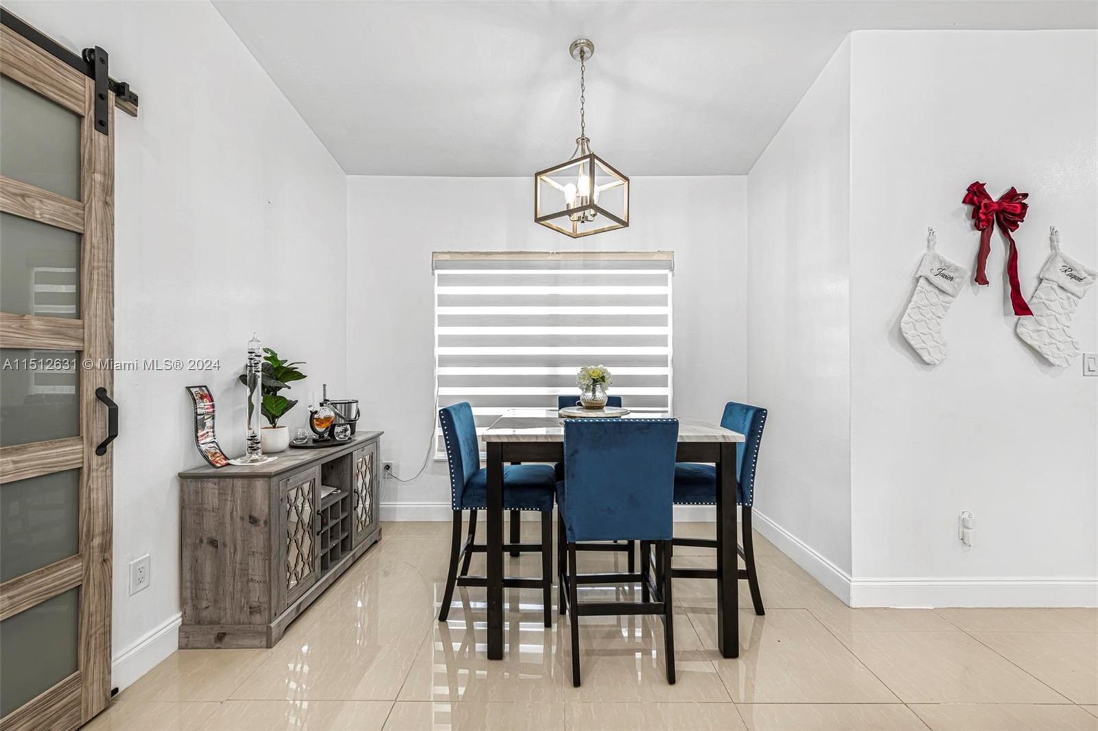 Palmetto Estates Miami, FL 33157 - Photo 10 of 29 a view of a dining room with furniture and window
