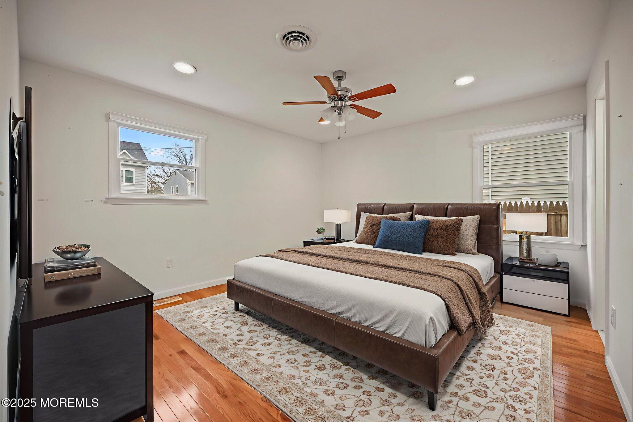 601 Marshall Drive Point Pleasant, NJ 08742 - Photo 15 of 21 a bedroom with bed and wooden floor