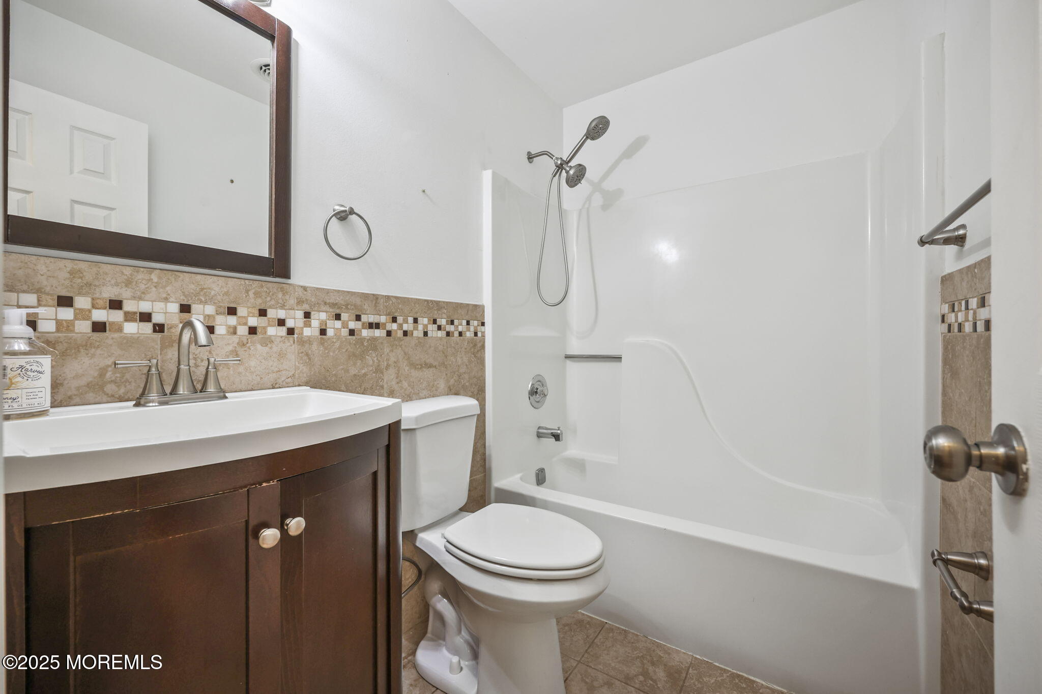 601 Marshall Drive Point Pleasant, NJ 08742 - Photo 18 of 21 a bathroom with a sink a toilet and shower