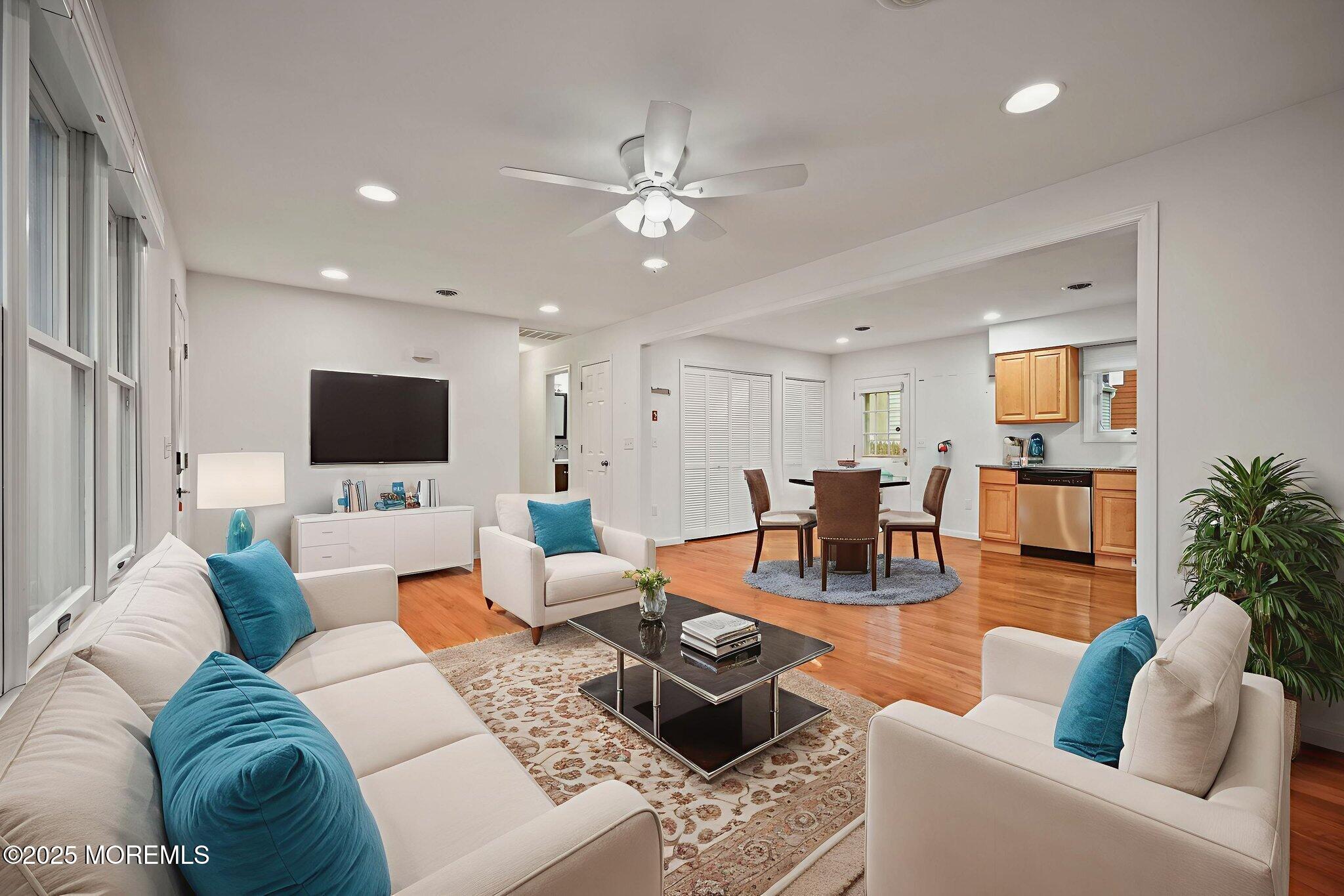601 Marshall Drive Point Pleasant, NJ 08742 - Photo 2 of 21 a living room with furniture and a flat screen tv