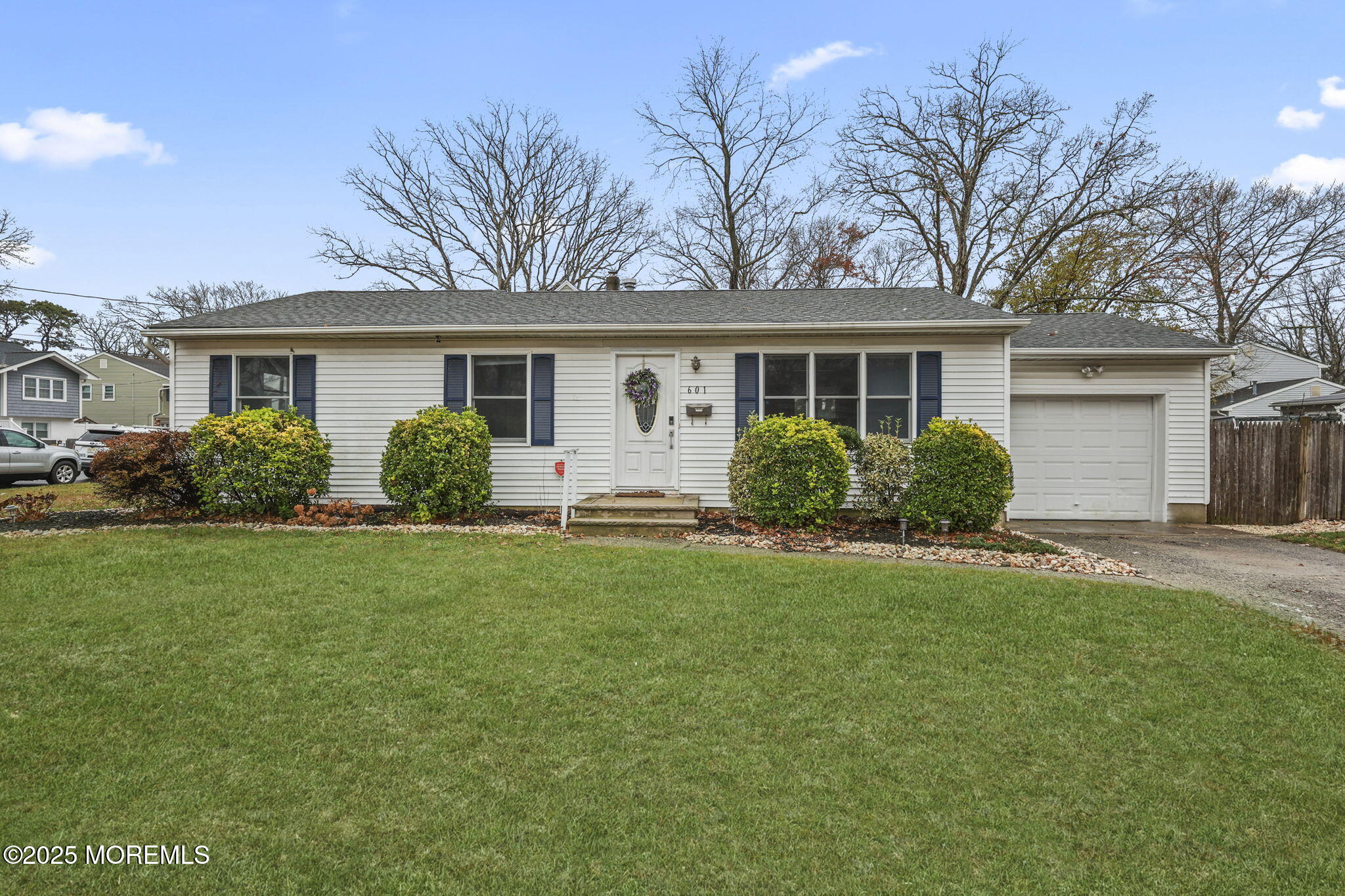 601 Marshall Drive Point Pleasant, NJ 08742 - Photo 4 of 21 a front view of house with yard and green space
