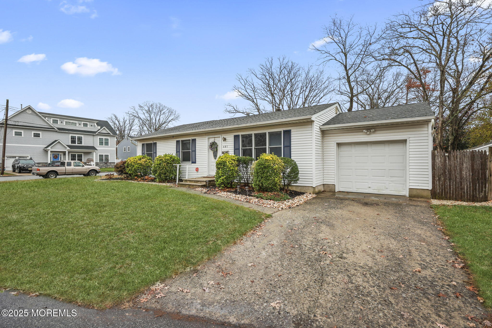 601 Marshall Drive Point Pleasant, NJ 08742 - Photo 5 of 21 a front view of a house with garden