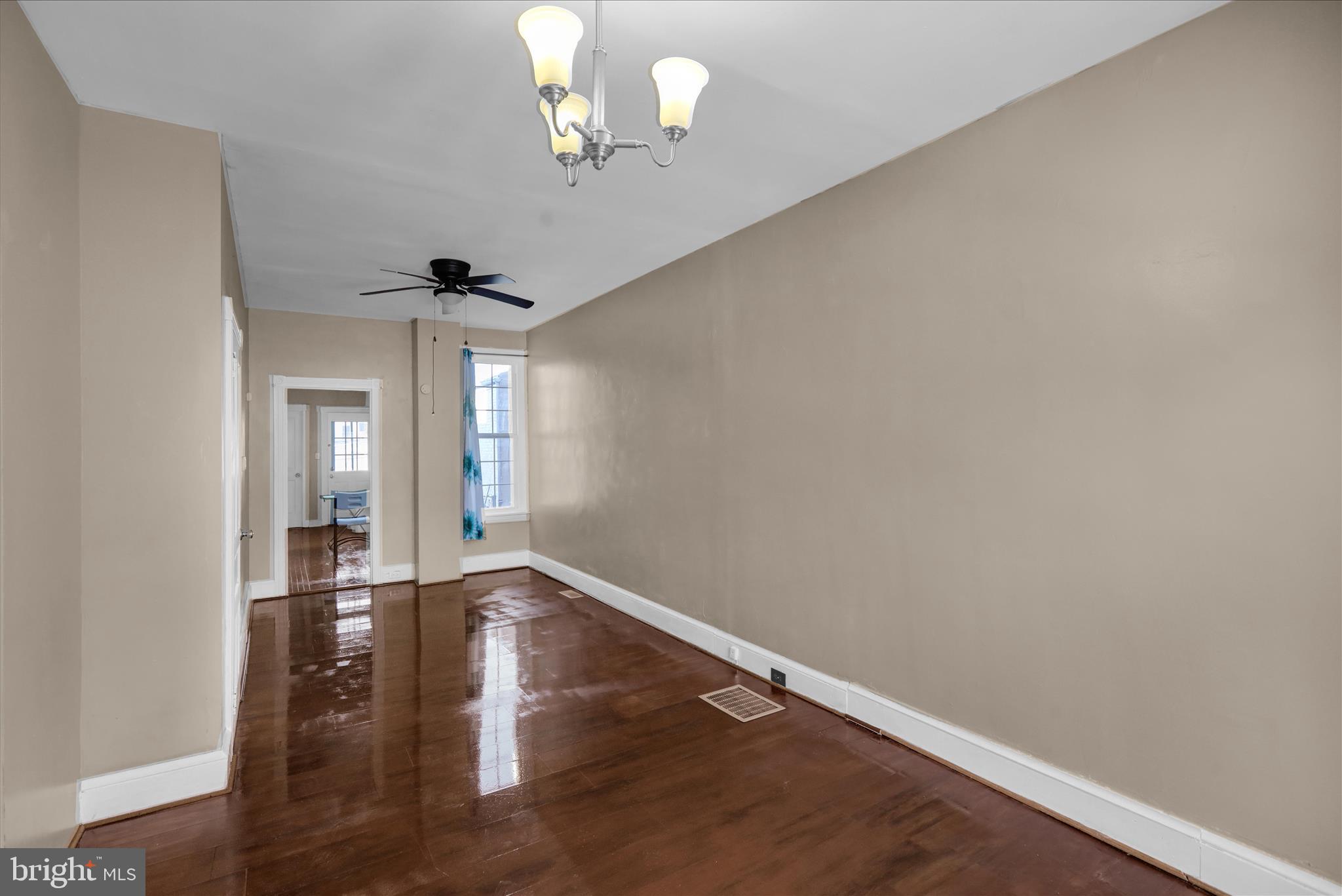 324 North 12th Street Reading, PA 19604 - Photo 5 of 27 wooden floor in an empty room with a window