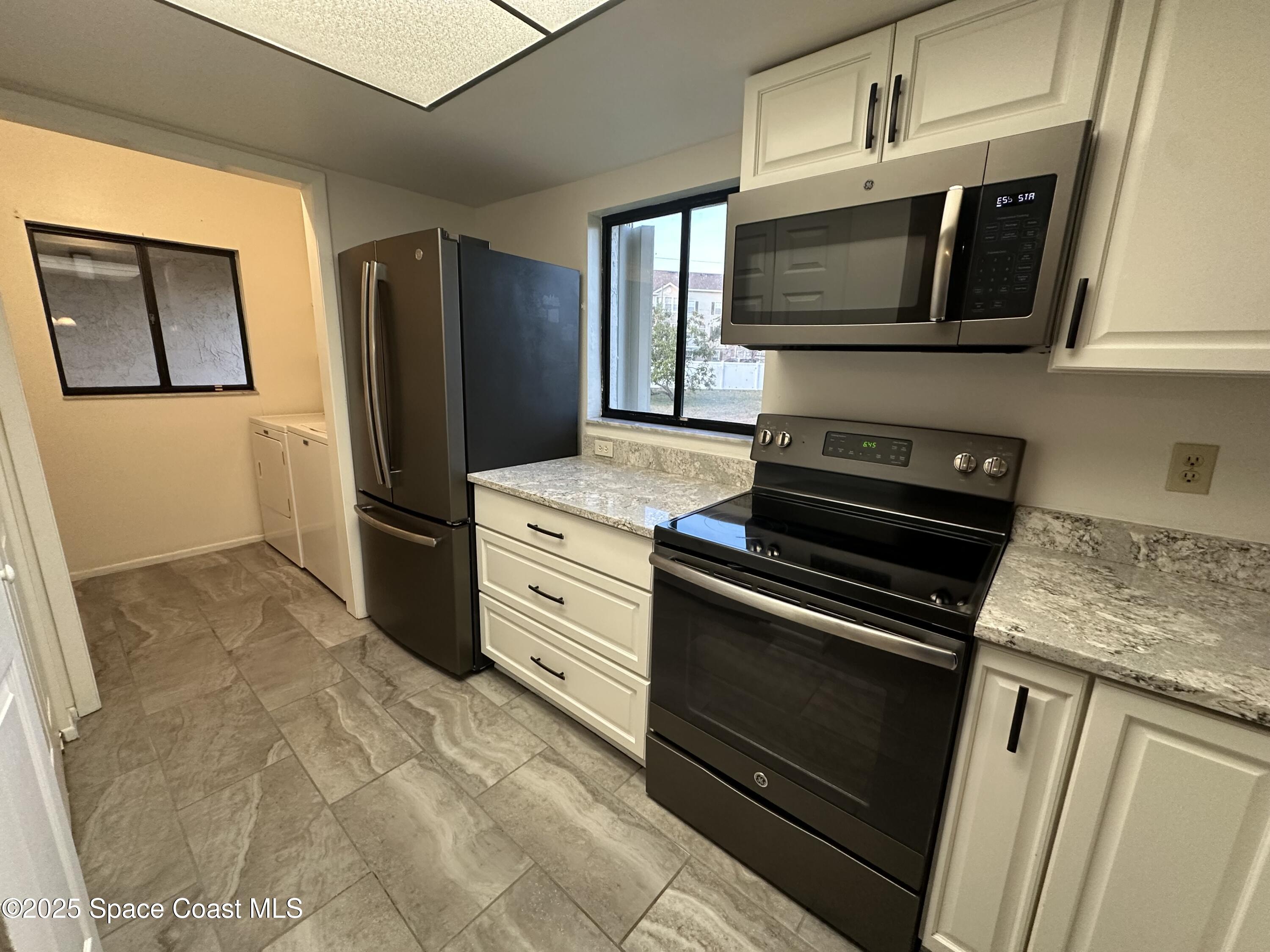 2775 North Wickham Road, Unit 101 Melbourne, FL 32935 - Photo 8 of 26 IMG_0817