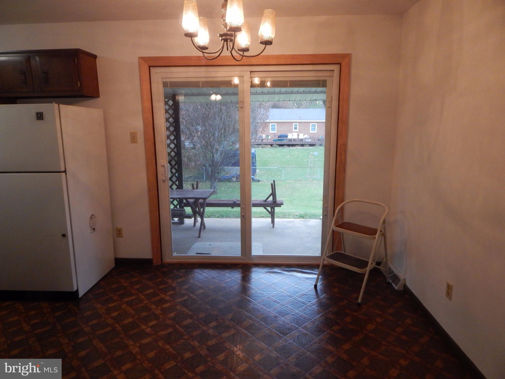 83 Wakefield Road Hagerstown, MD 21740 - Photo 5 of 22 a view of a livingroom with furniture and hardwood floor