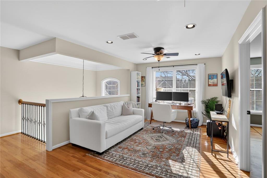 2355 Rosebrook Crossing Southeast Atlanta, GA 30339 - Photo 19 of 25 a living room with furniture and a large window