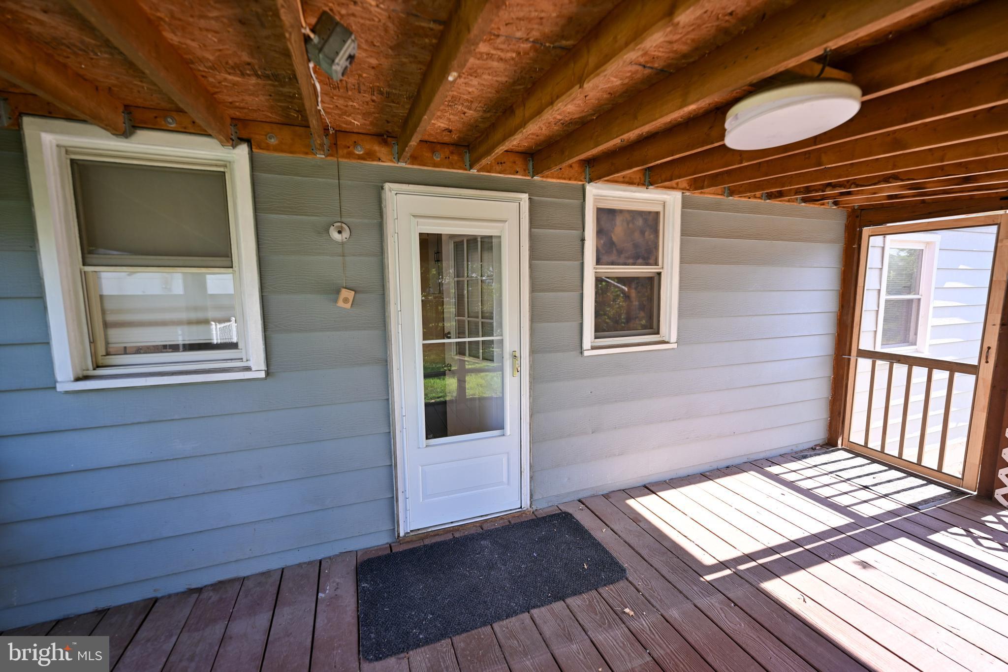 421 Cresswell Road Brooklyn, MD 21225 - Photo 12 of 56 Screened Rear Porch