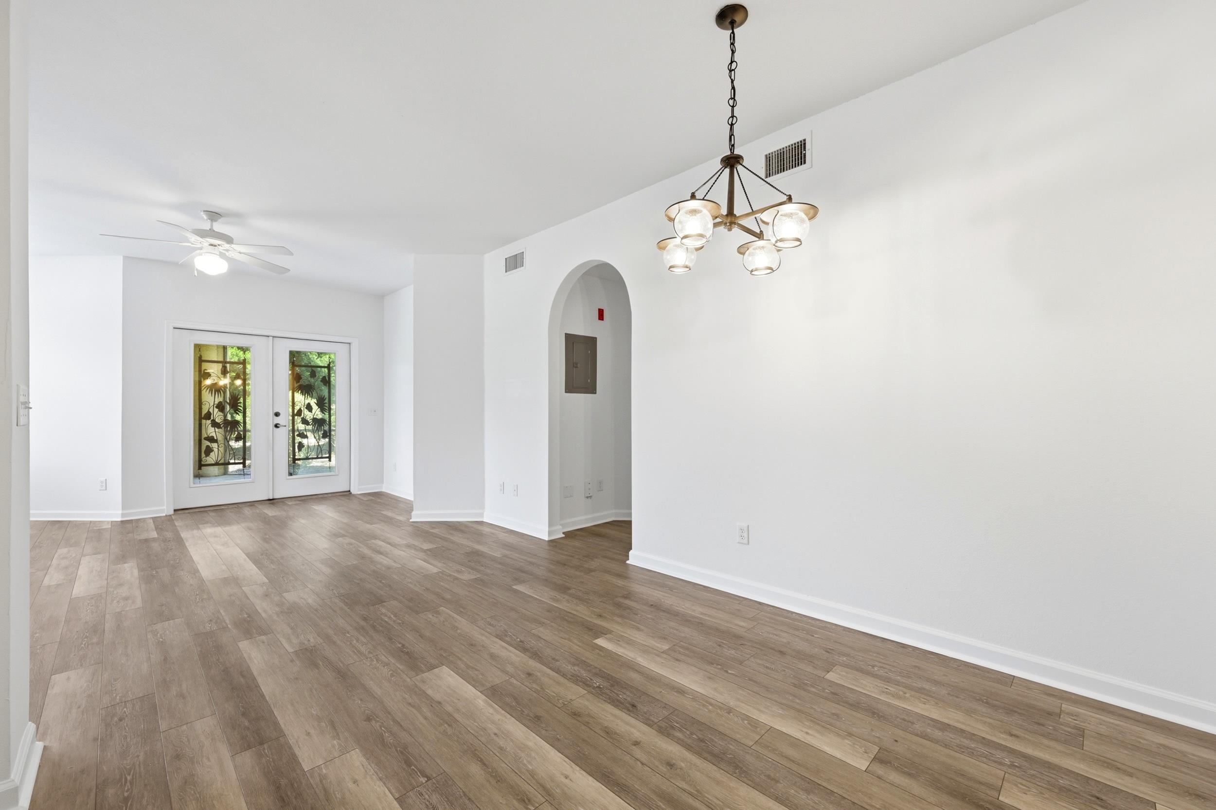 2500 Vista Cove Road St. Augustine, FL 32084 - Photo 14 of 53 a view of an empty room with window and wooden floor
