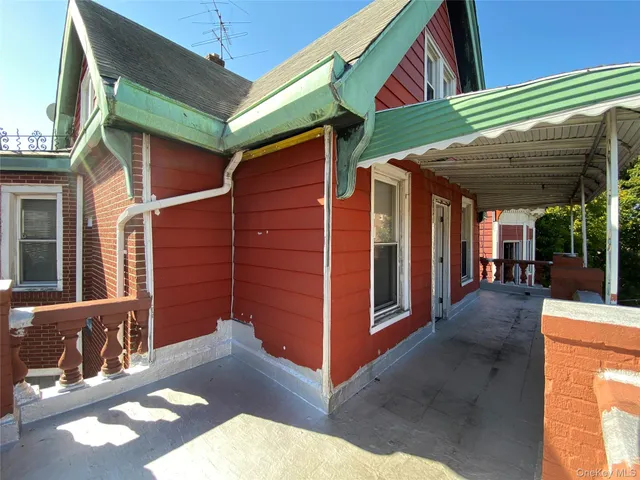 a view of a house with a porch