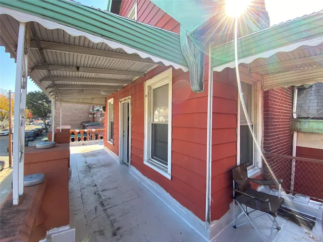 a view of a backyard with a patio
