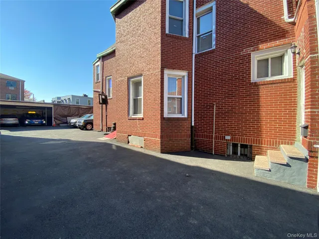 a view of a house with a street