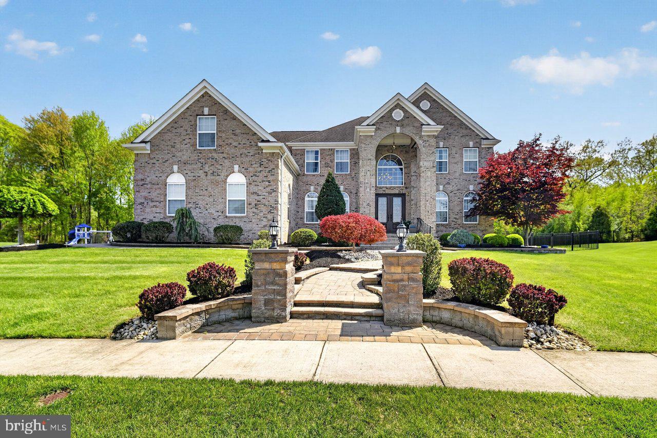 45 Emerald Road Robbinsville, NJ 08691 - Photo 3 of 57 Elegant brick estate with lush gardens.