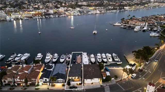 an aerial view of multiple house with yard