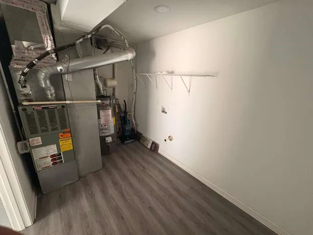 a backyard of a house with trees and outdoor space