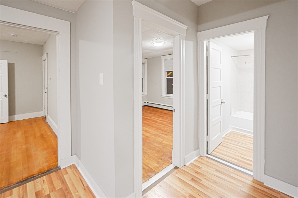 15 Mendon Street, Unit 3 Worcester, MA 01604 - Photo 13 of 28 a view of a bathroom from the hallway