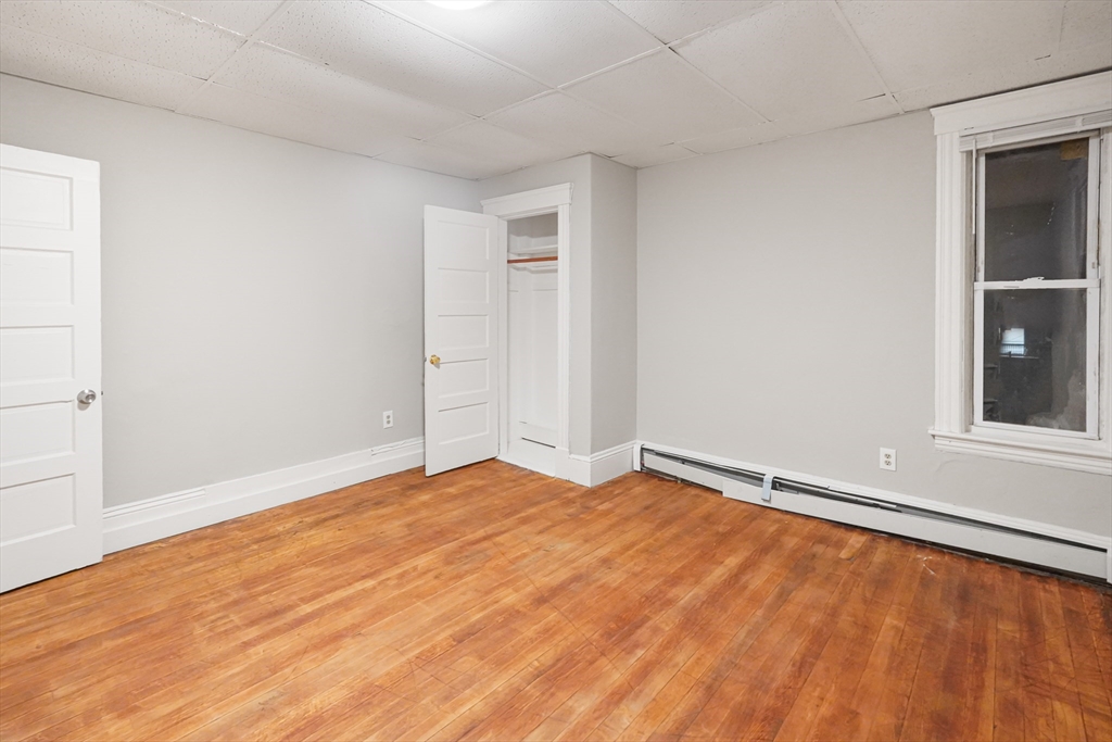 15 Mendon Street, Unit 3 Worcester, MA 01604 - Photo 15 of 28 a view of an empty room and window