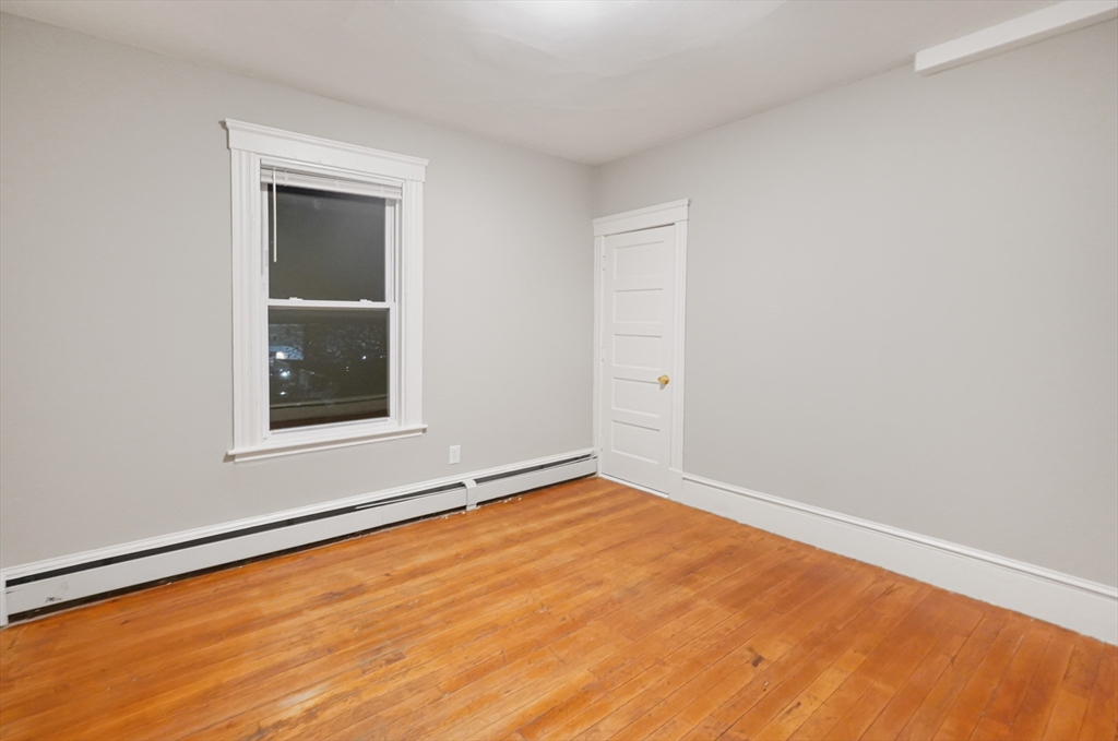 15 Mendon Street, Unit 3 Worcester, MA 01604 - Photo 24 of 28 an empty room with window
