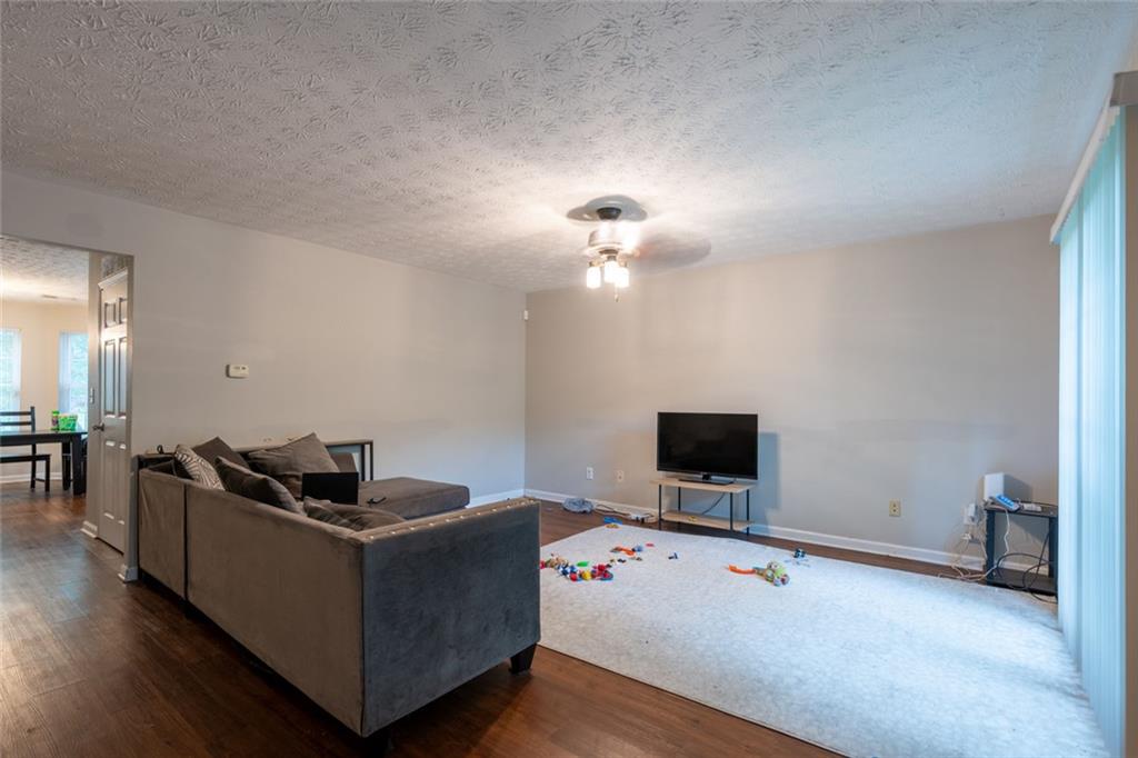3474 Waldrop Trail Decatur, GA 30034 - Photo 3 of 17 a living room with furniture and a flat screen tv
