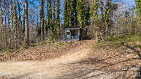 a view of a backyard of the house