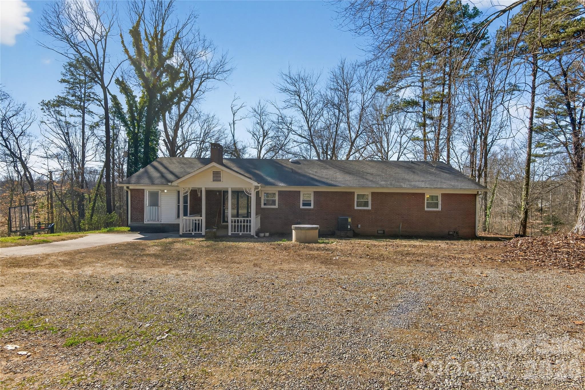 926 Mauney Road Stanley, NC 28164 - Photo 5 of 23 a front view of a house with a yard