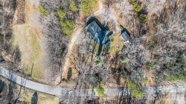 a view of a house with a tree