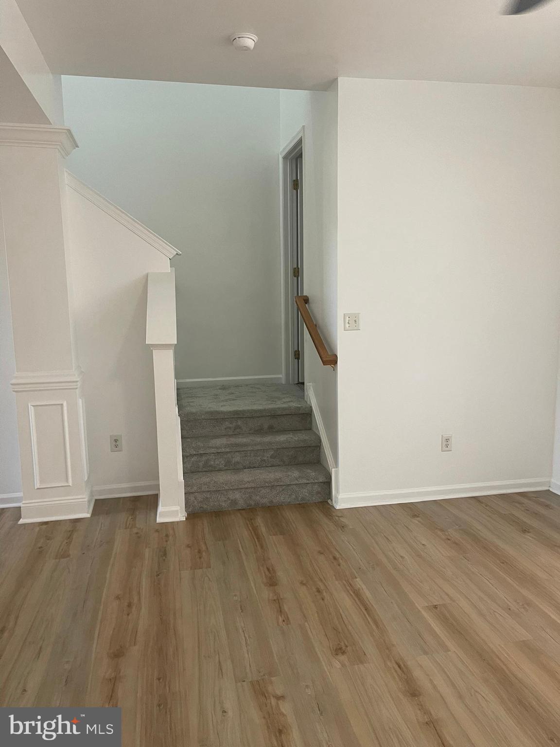 62 Springfield Circle Middletown, DE 19709 - Photo 11 of 37 an empty room with wooden floor