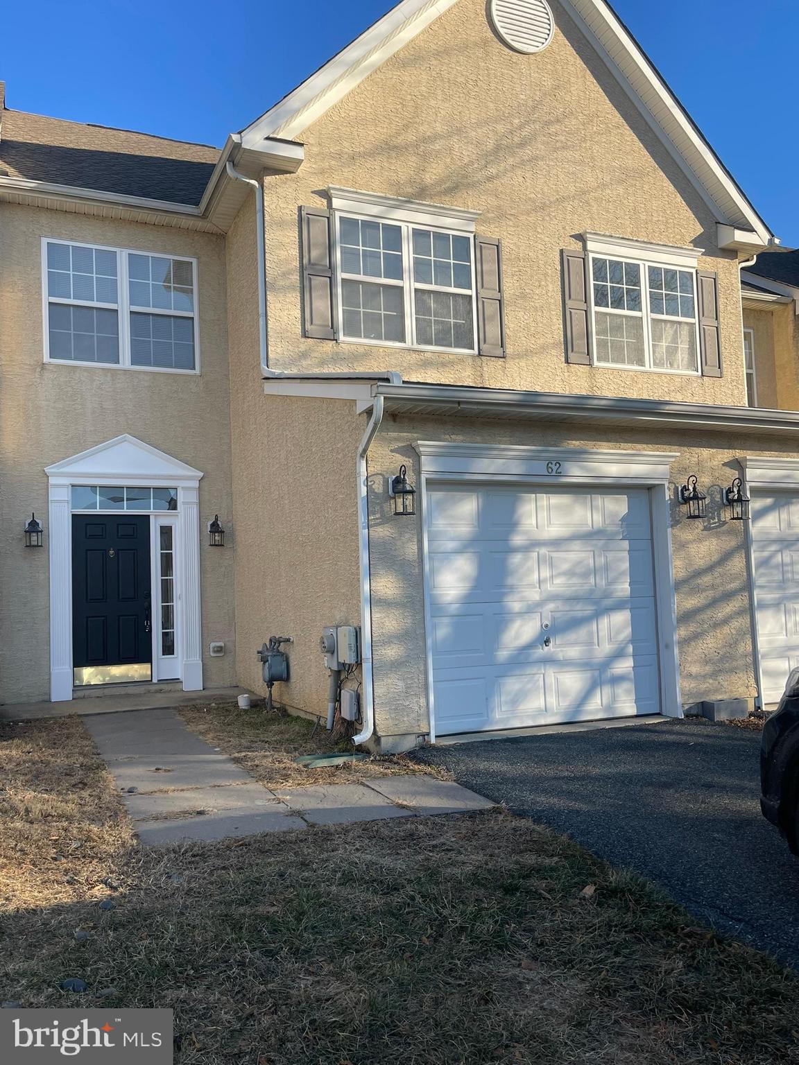 62 Springfield Circle Middletown, DE 19709 - Photo 2 of 37 a front view of a house with a yard