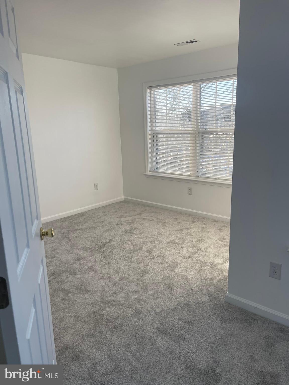 62 Springfield Circle Middletown, DE 19709 - Photo 23 of 37 an empty room with a window