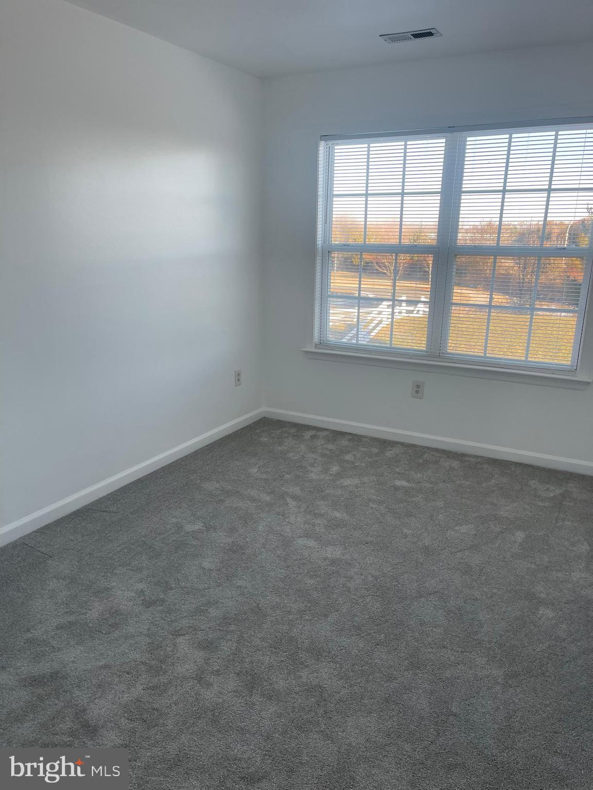 62 Springfield Circle Middletown, DE 19709 - Photo 32 of 37 an empty room with a window