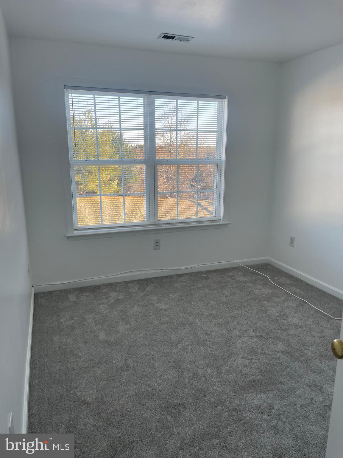 62 Springfield Circle Middletown, DE 19709 - Photo 33 of 37 an empty room with a window