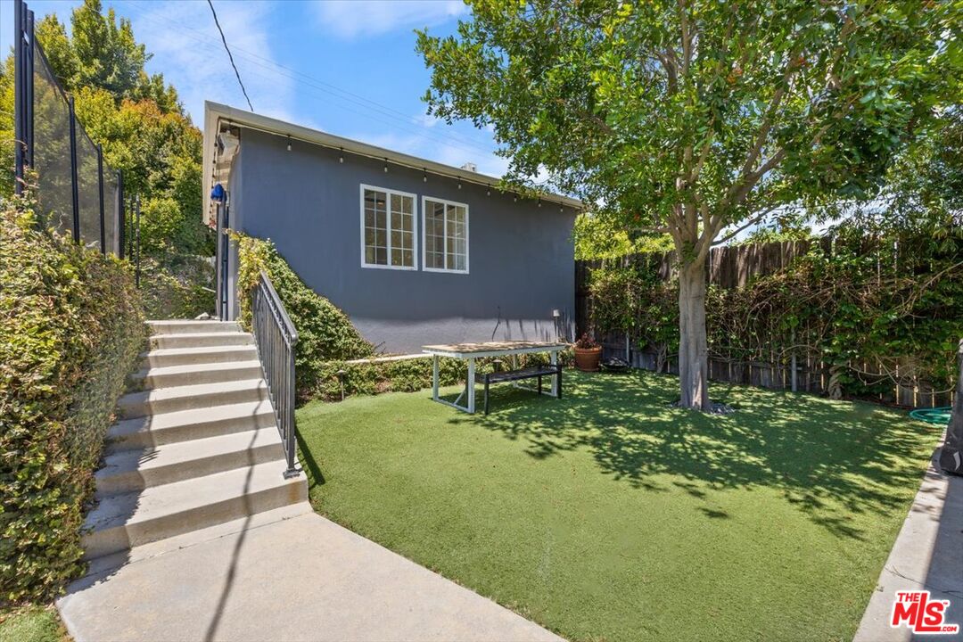 14041 Roblar Road Sherman Oaks, CA 91423 - Photo 38 of 47 a backyard of a house with outdoor seating