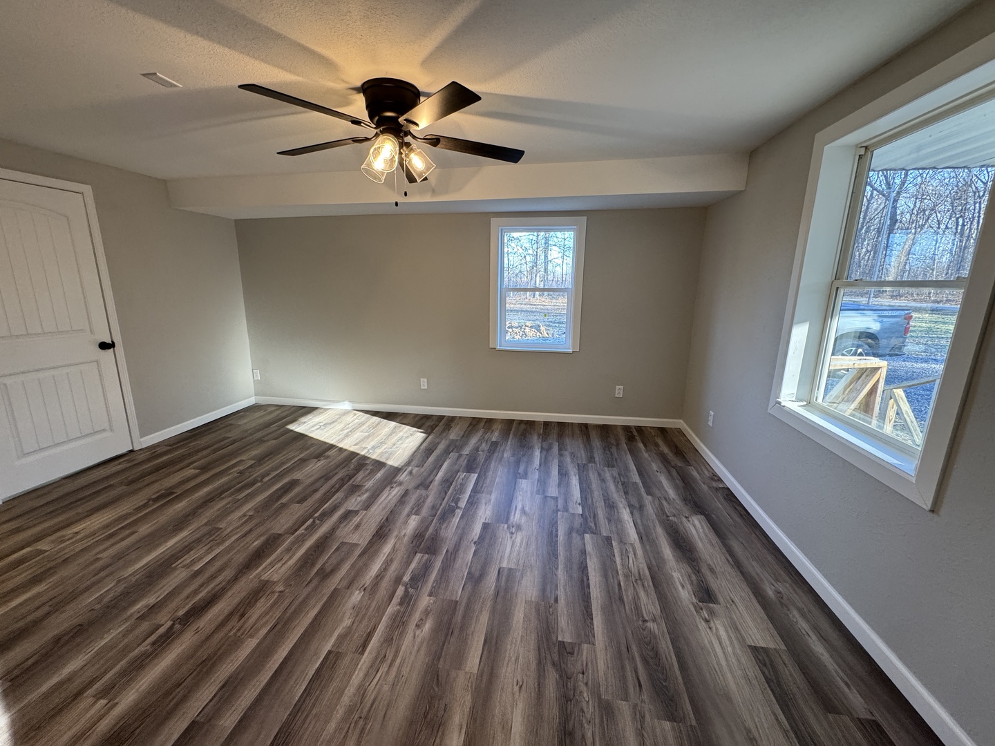 1981 Watercress Lane Flora, IL 62839 - Photo 13 of 76 wooden floor in an empty room with a window