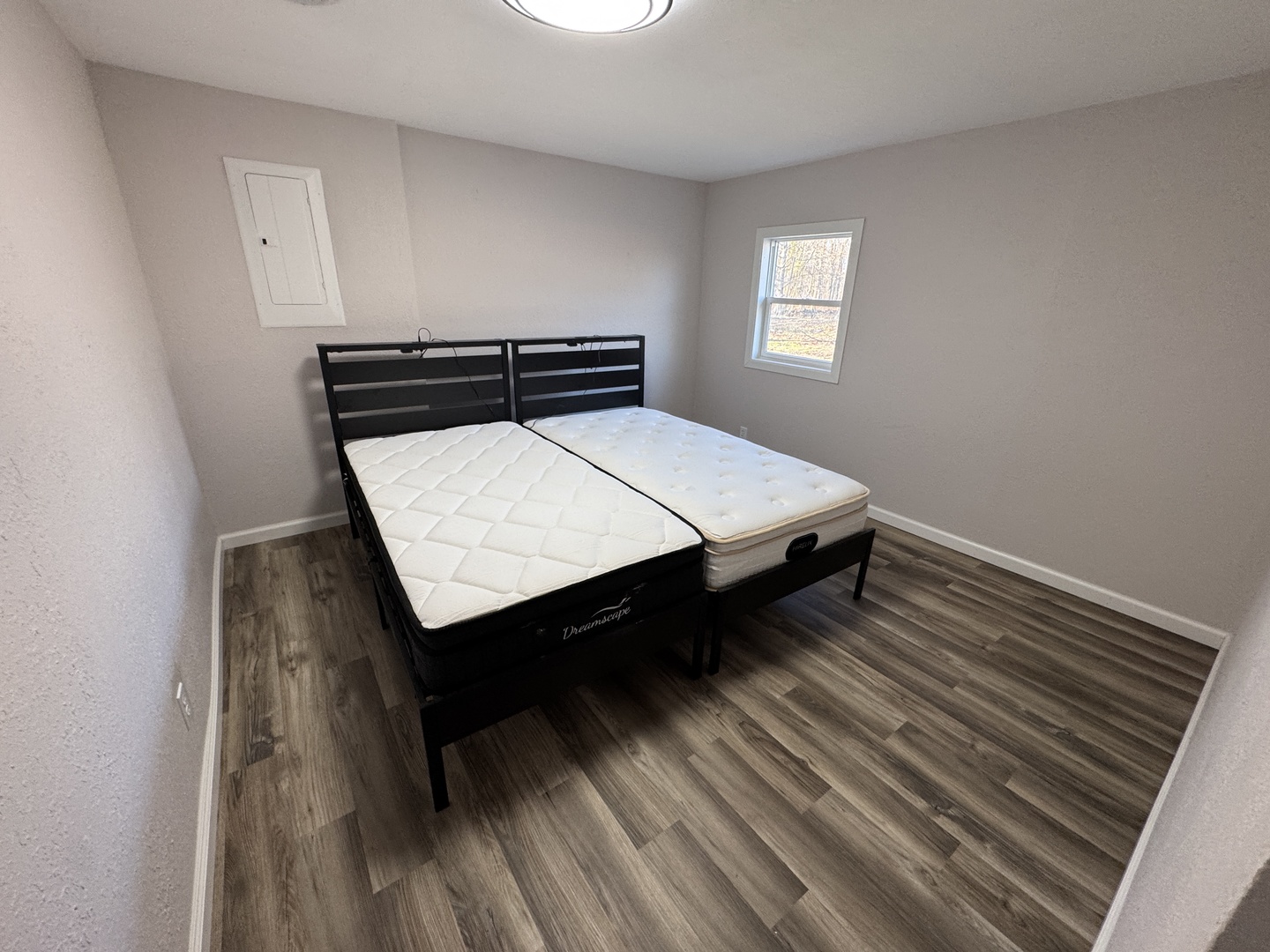 1981 Watercress Lane Flora, IL 62839 - Photo 20 of 76 a bed sitting in a bedroom with wooden floor