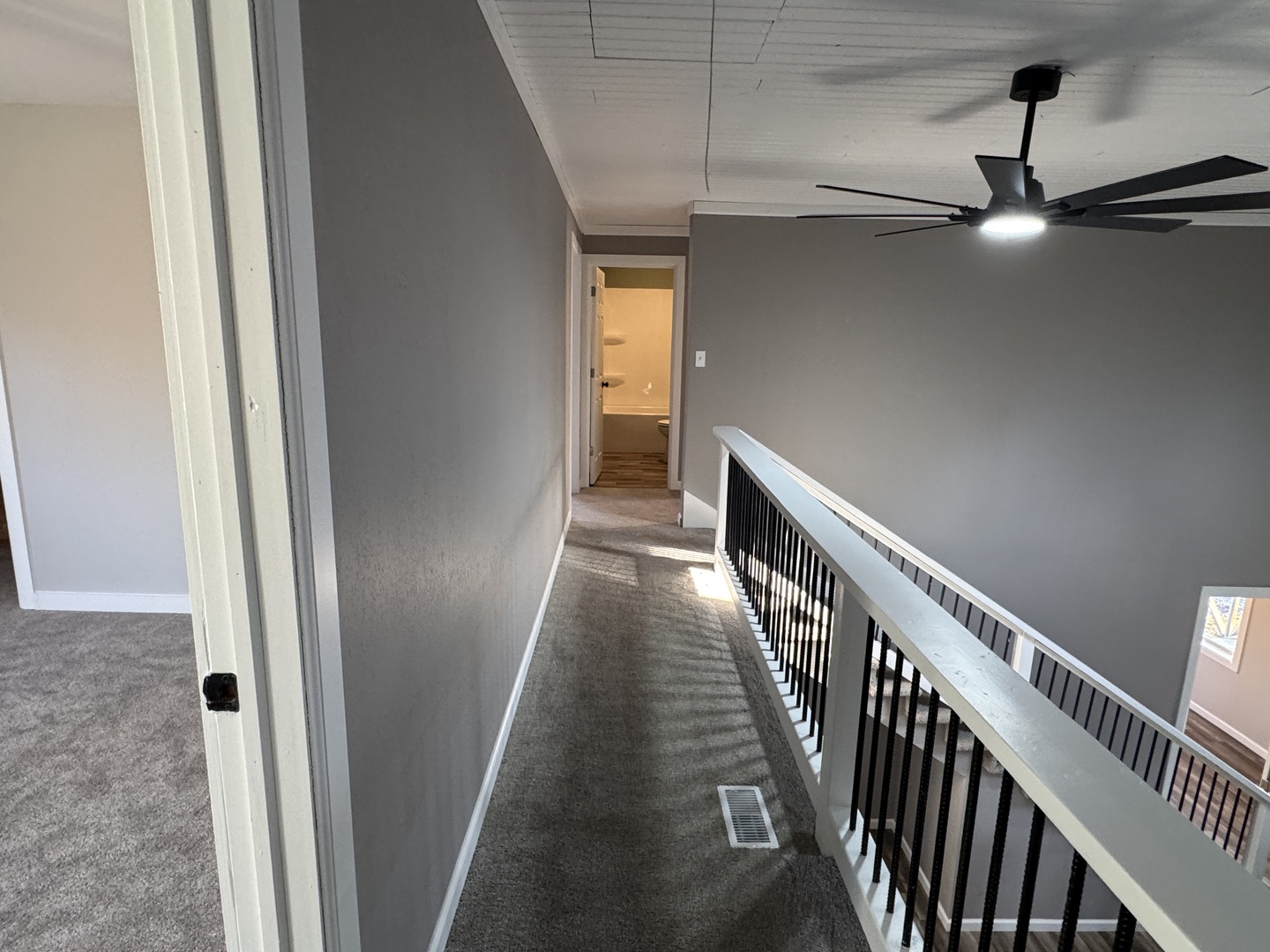 1981 Watercress Lane Flora, IL 62839 - Photo 37 of 76 a view of a hallway with wooden floor and staircase
