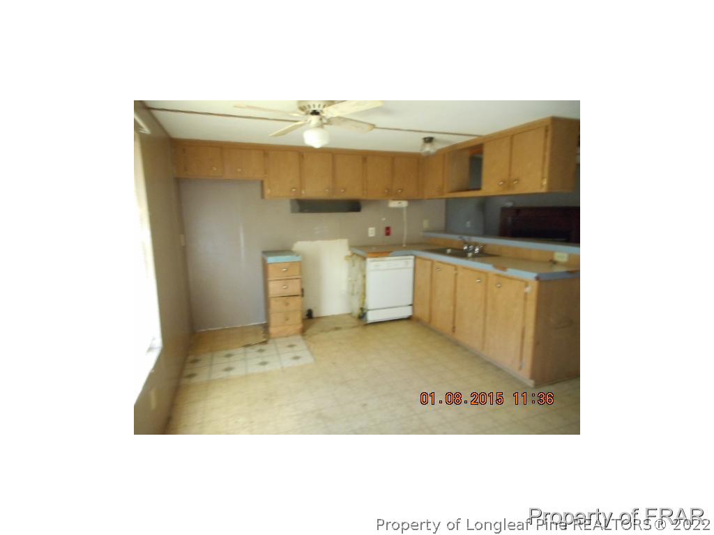 1948 Page Road Stedman, NC 28391 - Photo 2 of 10 a kitchen with a sink and cabinets