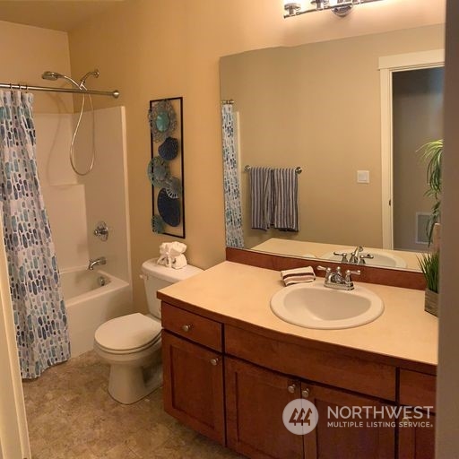 23029 35th Drive Southeast Bothell, WA 98021 - Photo 25 of 40 a bathroom with a sink a toilet and shower