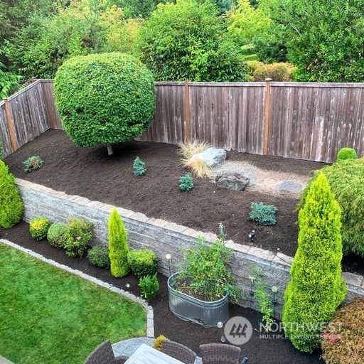 23029 35th Drive Southeast Bothell, WA 98021 - Photo 30 of 40 a view of a backyard with a fence