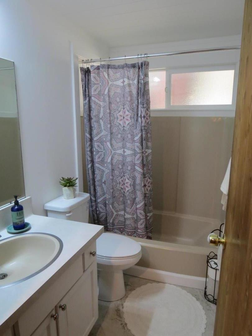 66 Wurr Road Loma Mar, CA 94021 - Photo 13 of 34 a bathroom with a sink toilet and shower