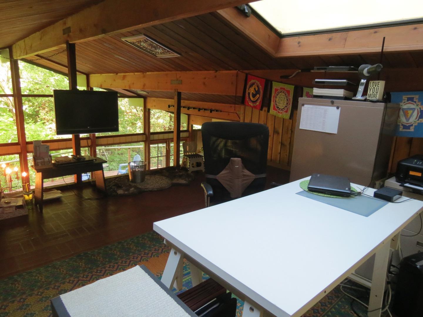 66 Wurr Road Loma Mar, CA 94021 - Photo 9 of 34 a view of a dining room with furniture and wooden floor