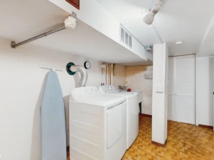 a view of a patio with table and chairs with wooden floor