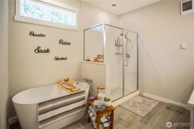 a bathroom with a sink and a shower