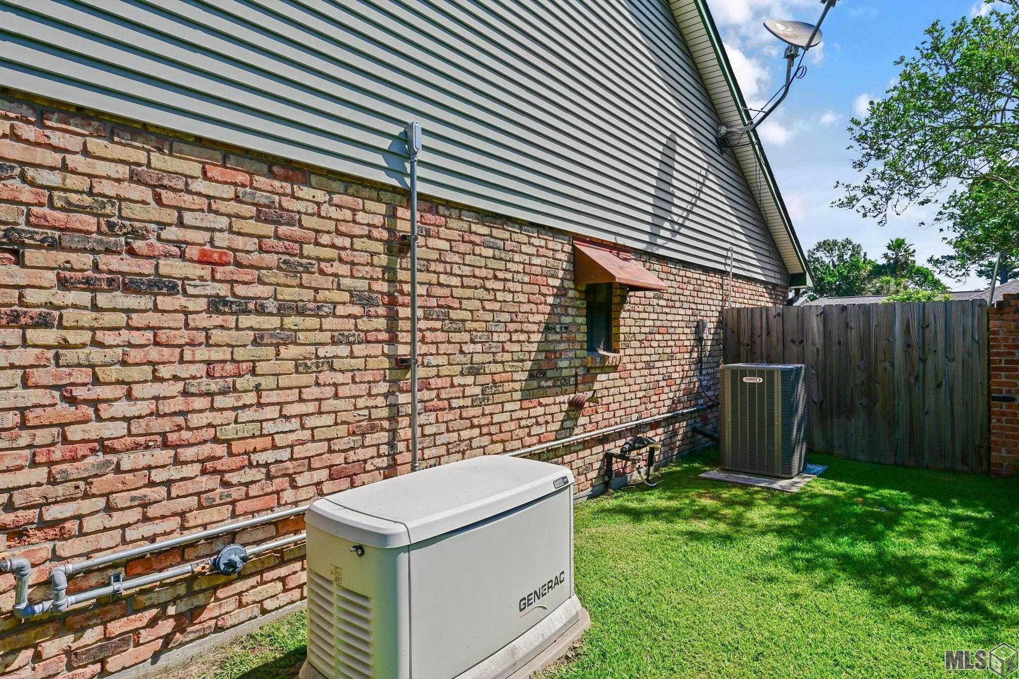 9979 Hackberry Drive Baton Rouge, LA 70809 - Photo 27 of 27 Full house generator