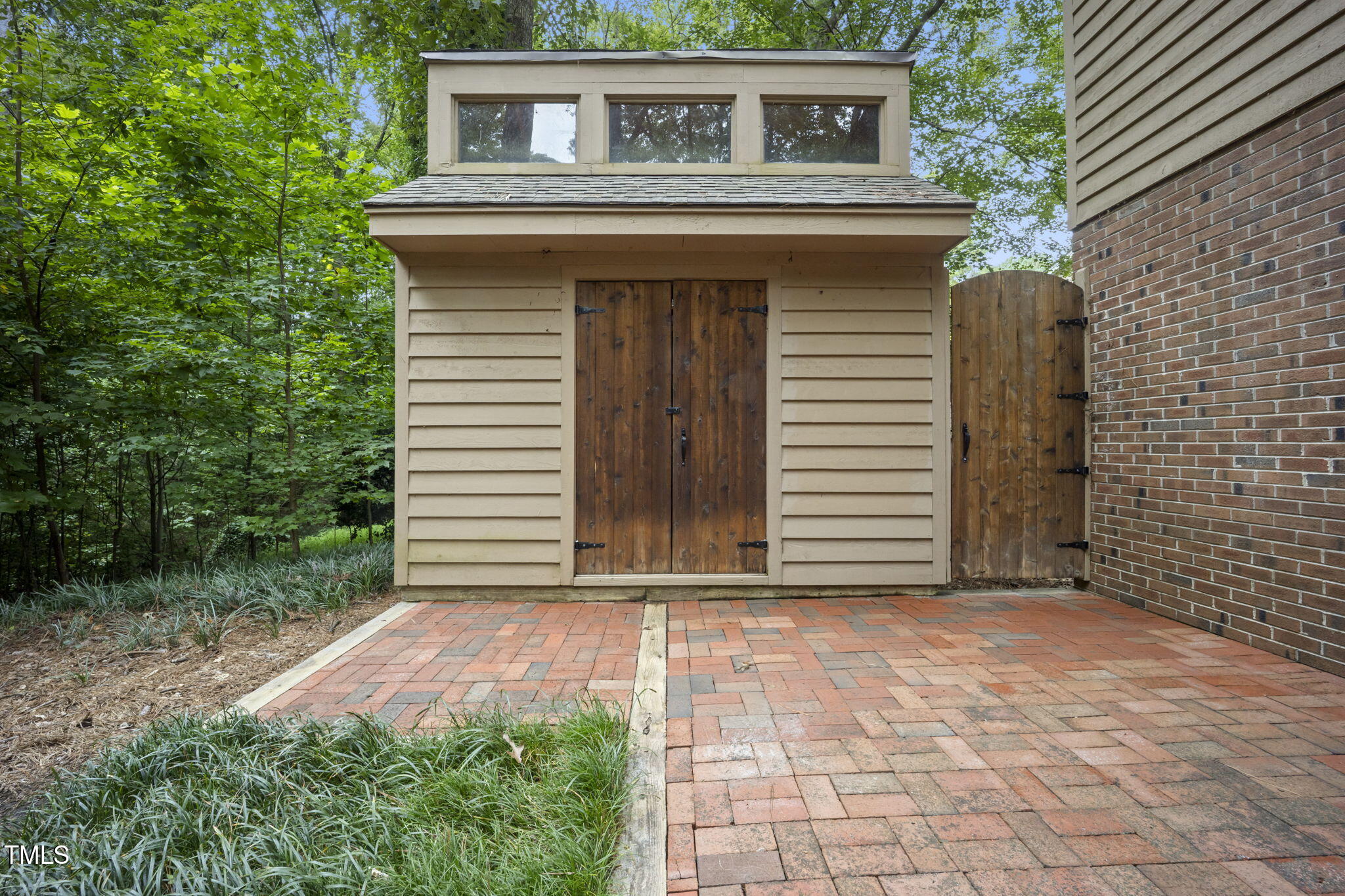 7316 Chicora Court Raleigh, NC 27615 - Photo 48 of 58 Garden Shed & Gate to Garden