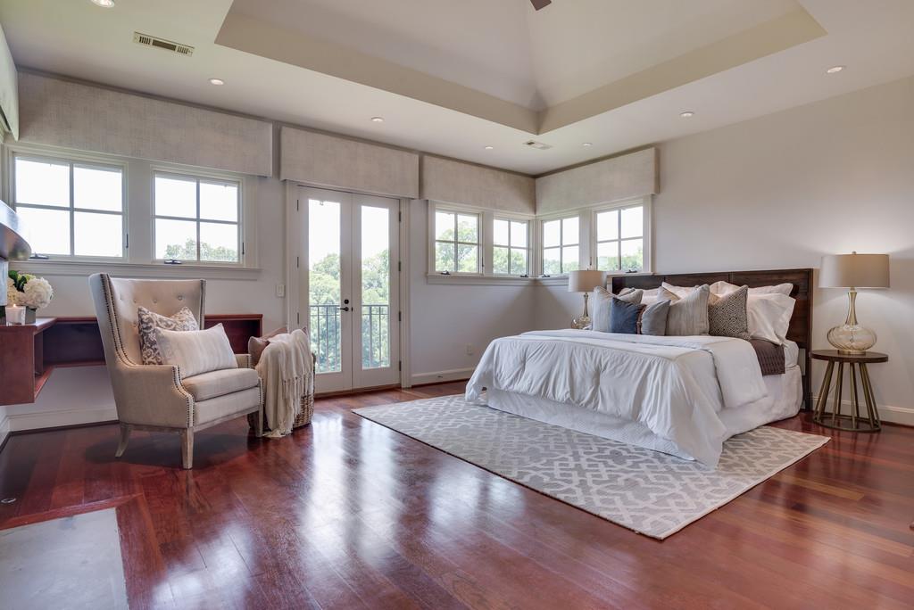 1710 Lawrence Road Franklin, TN 37069 - Photo 14 of 30 a spacious bedroom with a bed and wooden floor