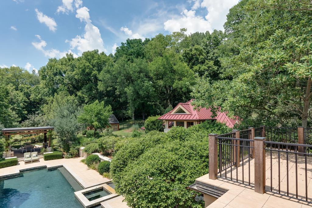 1710 Lawrence Road Franklin, TN 37069 - Photo 17 of 30 a patio with table and chairs