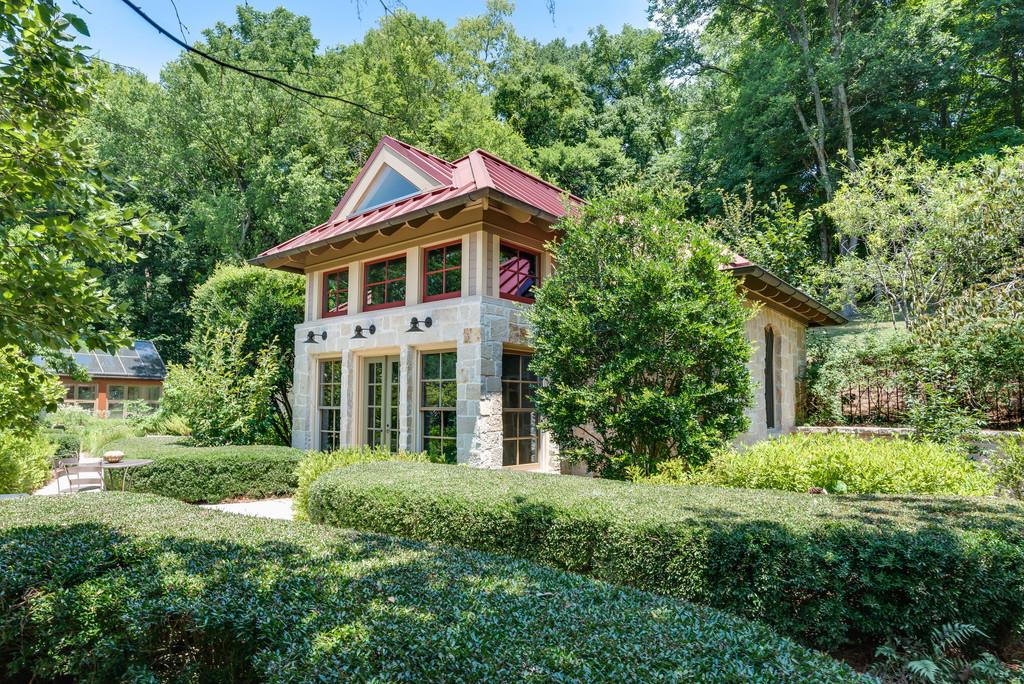 1710 Lawrence Road Franklin, TN 37069 - Photo 24 of 30 a yellow house with lots of trees