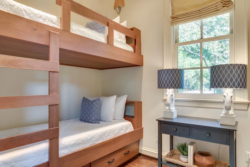 1710 Lawrence Road Franklin, TN 37069 - Photo 26 of 30 a bedroom with a bed a lamp and a window